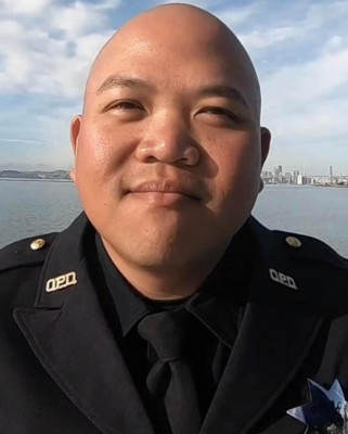 Police Officer Tuan Le
